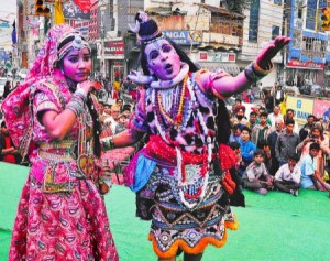 Artistes dressed up as Lord Shiva andParvati at a procession to mark Shivratri celebrations in Jalandhar