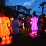 Visitors look at lanterns in the shape of the Chinese Terracotta Warriors at Sydney Harbour on February 13, 2015. The artworks, created for the Beijing Olympic Games in 2008 by a team of Chinese artists, is on display for the first time in Australia to launch the Australian celebrations of the Lunar New Year of the Sheep.