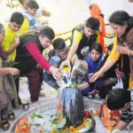 Devotees offer milk to the Shivalingam on the occasion of Mahashivratri in Chandigarh
