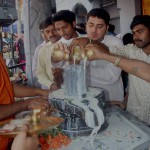 Devotees pour milk on a Shivling as they offer prayers on the occasion of Mahashivratri in Bengaluru