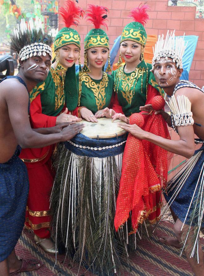 Folk artists at the Surajkund International Crafts Mela in Faridabad, Haryana, on February 6.