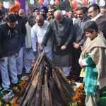 Haryana Governor Kaptan Singh Solanki lights a bonfire to mark Lohri festival in Karnal