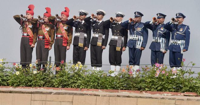 Services' bands perform to pay tributes to Mahatma Gandhi on his death anniversary, observed as Martyrs' Day, at Rajghat in New Delhi on January 30, 2015