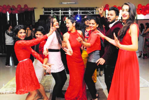 Students of the INIFD dance during a Valentine bash at the Community Centre in Sector 27 Chandigarh