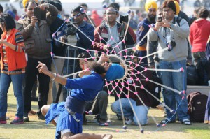 A Nihang showcasing his skills at the 79th Kila Raipur Sports Festival at Kila Raipur village, Ludhiana