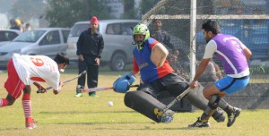 A hockey match in progress between Kila Raipur and Sangrur at 79th Kila Raipur Sports Festival at Kila raipur village, Ludhiana