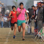 Girls taking part in 800m race on the concluding day of the 79th Kila Raipur Sports Festival at Kila Raipur village, Ludhiana