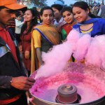 A man sells candy floss during the Saras Mela in Bathinda