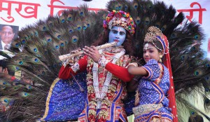 Artiste dressed up Radha Krishna during a Shobha Yatra as part of the Ram Navmi celebrations in Jalandhar