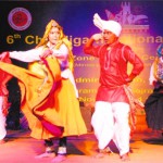 Artistes present a folk dance of Haryana during the Chandigarh National Crafts Mela at Kala Gram in Chandigarh