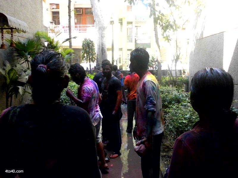 Boys and Girls color each other on Holi festival