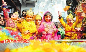 Children celebrate Holi dressed as Lord Krishna and Radha at Maple Bear Canadian_preschool in Ludhiana