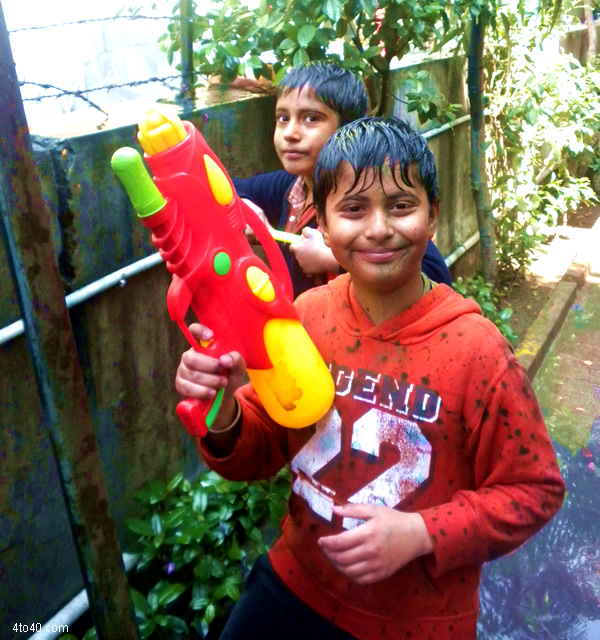 Children playing with Waterguns on Holi festival