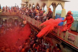 Devotees celebrate Lathmaar Holi at Sriji Temple, Barsana, Mathura
