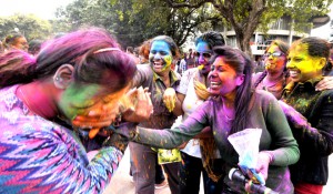 Female students of Panjab University celebrating Holi at the Students Center on the university campus