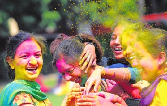 Girls celebrate Holi at a college in Ludhiana