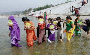 Hindu devotees carry Saakh depicting Goddess Durga for immersion in the River Tawi on the on the occasion of Ram Navami in Jammu