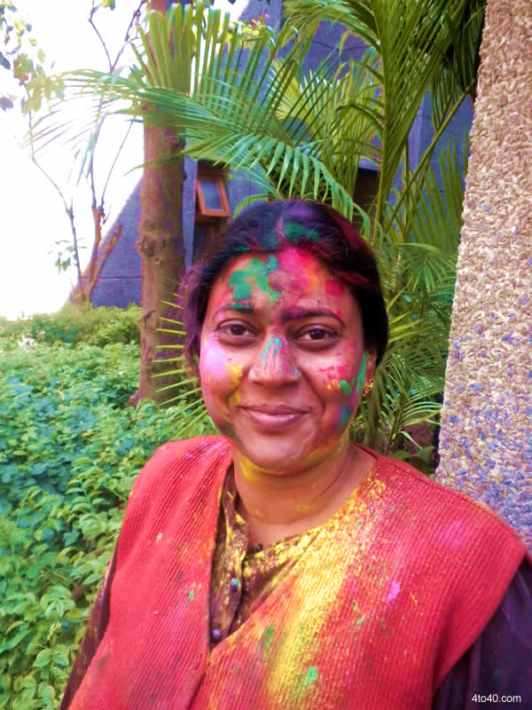 Indian woman celebrating Holi Festival