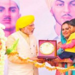 Manjula Sandhu grand neice of Bhagat Singh being honoured by the Prime Minister at Hussainiwala in Ferozpur