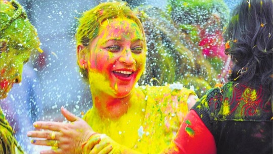 Members of the Aastha Ladies Club have a gala time during the Holi celebrations in Ludhiana