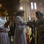 Pakistani Christian devotees attend a service marking Easter at Sacred Heart Cathedral in Lahore