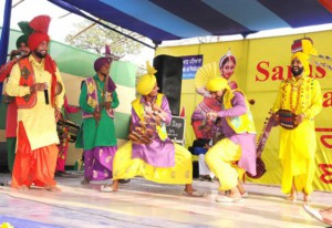 Punjabi artists perform Bhangra during the Saras Mela in Bathinda