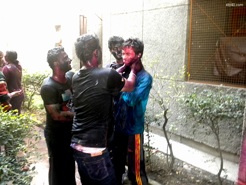 Putting colors on friends on Holi festival