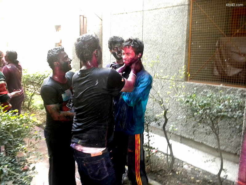 Putting colors on friends on Holi festival
