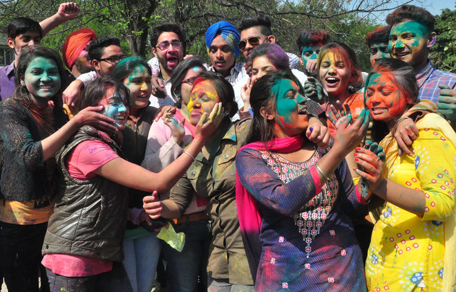 Students celebrate Holi at Government College of Commerce and Business Administration Sector 42 in Chandigarh