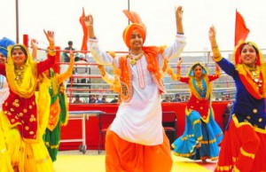 Students of LPU perform bhangra during the opening ceremony of the AIU Boxing Championship on the campus near Jalandhar