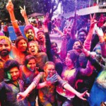 Students of Punjab University celebrate Holi at the Students Centre