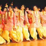 Students of St Kabir Public School present a dance item during the investiture ceremony on the school campus in Sector 26, Chandigarh