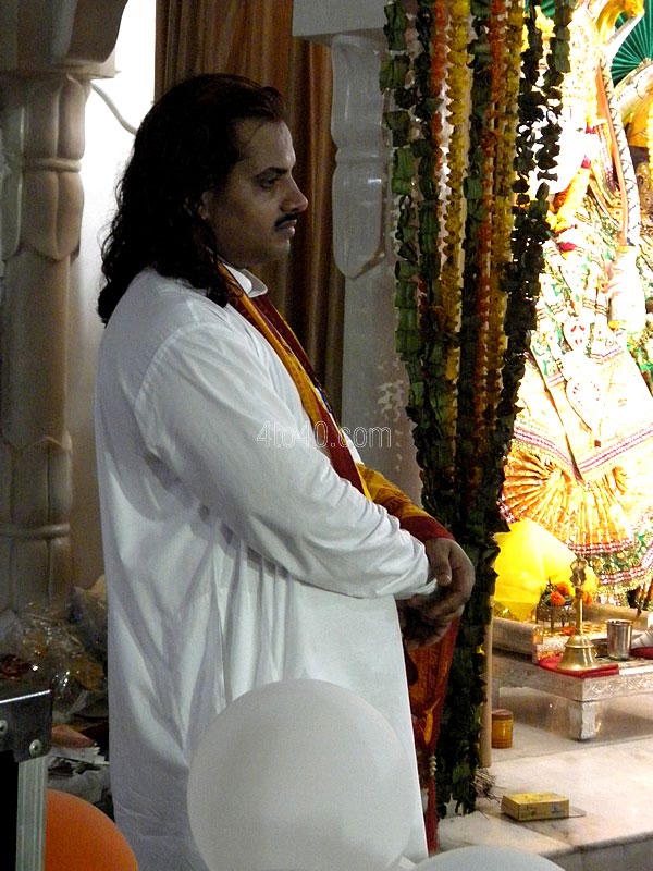 Temple priest looking at ongoing celebrations during Rama Navami Festival