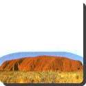 At what time of day does Ayers Rock in Central Australia change color?