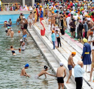 Devotees throng the Golden temple to take the holy dip and pay obeisance on Baisakhi in Amritsar