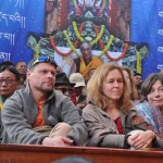 Tourists enjoying a Tibetan dance at the Shoton festival during 20th Shoton Festival at the Tibetan Institute of Performing Arts in Dharamsala