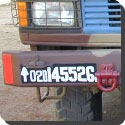 What does the arrow mark on defence vehicle number plates mean?