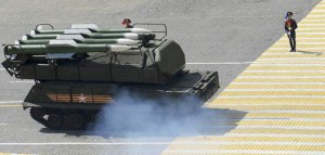 A Russian BUK-M2/SA-17 Grizzly medium-range battlefield surface-to-air missile system drives during the Victory Day parade at Red Square in Moscow, Russia, on May 9, 2015.