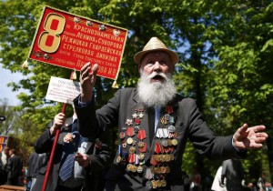 A World War Two veteran reacts during the celebrations for the Victory Day at the Gorky Central Park of Culture and Leisure in Moscow, Russia, on May 9, 2015. Russia marks the 70th anniversary of the end of World War Two in Europe on Saturday with a military parade, showcasing new military hardware at a time when relations with the West have hit lows not seen since the Cold War.