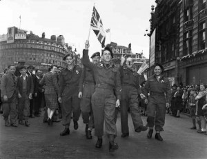 Canadian soldiers celebrate VE-Day at Piccadilly Circus, London, May 8,1945, in this handout photo provided by Library and Archives Canada.