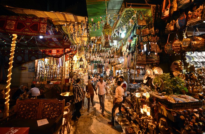 Egyptians walk at the Khan el-Khalili market in Cairo during the Muslim holy fasting month of Ramadan