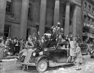 Military personnel and civilians celebrate VE-Day on Sparks Street in Ottawa, Ontario, May 8, 1945, in this handout photo provided by Canada Department of National Defence.