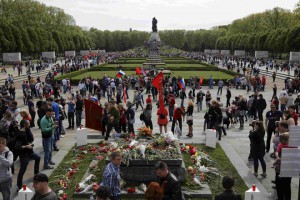 People take part in celebrations to mark Victory Day, at the Soviet War Memorial in Treptower Park in Berlin, Germany, on May 9, 2015.