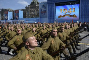 Russian servicemen in historical Red Army uniforms march during the Victory Day parade at Red Square in Moscow, Russia, on May 9, 2015.