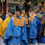 Shinto studies specialty students in traditional costumes gather before a ritual for the Kanda festival at the Kanda-Myojin shrine in Tokyo on May 9, 2015.