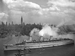 The British liner RMS Queen Mary arrives with thousands of U.S. troops from Europe, in New York harbour on June 20, 1945
