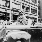 US General Dwight D. Eisenhower waves to the crowd at a parade in the United States in 1945