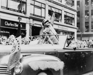 US General Dwight D. Eisenhower waves to the crowd at a parade in the United States in 1945