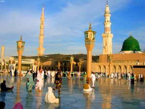 Medina is a city in western Saudi Arabia. In the city center, the vast Al-Masjid an-Nabawi (Prophet's Mosque) is a major Islamic pilgrimage site. Its striking Green Dome rises above the tombs of the Prophet Muhammad and early Islamic leaders Abu Bakr and Umar. The Masjid al-Qiblatain (Qiblatain Mosque) is known as the site where the Prophet Muhammad received the command to change the direction of prayer to Mecca.