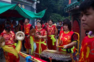 In this picture taken on May 10, 2015, members of a lion dance team perform at Joss House temple to celebrate the Tin Hau festival in Hong Kong.